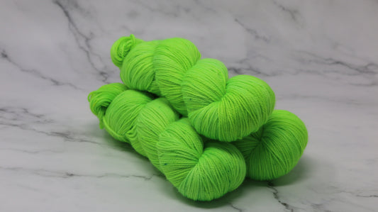 Three skeins of neon green yarn