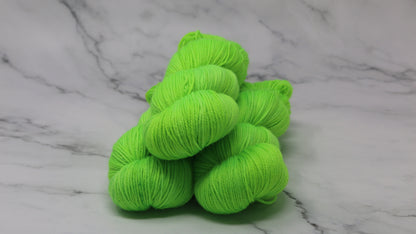 Three skeins of neon green yarn