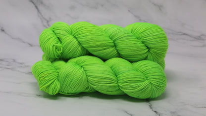Three skeins of neon green yarn