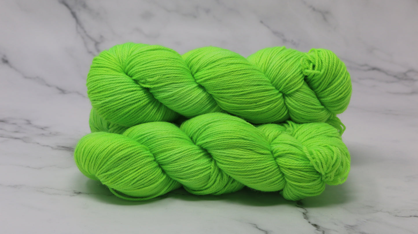 Three skeins of neon green yarn