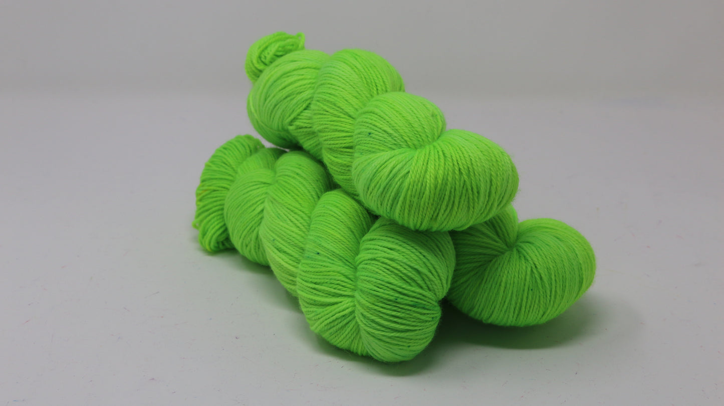Three skeins of neon green yarn
