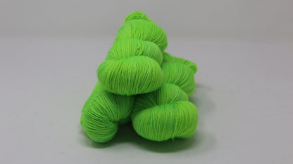 Three skeins of neon green yarn