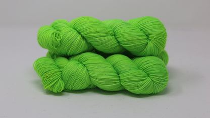 Three skeins of neon green yarn